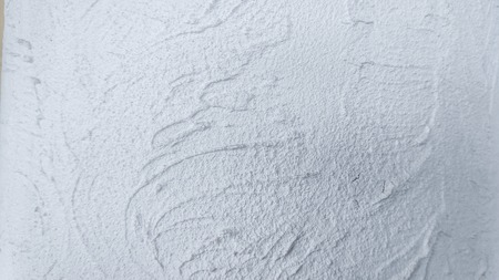texture of white plastered wallの写真素材