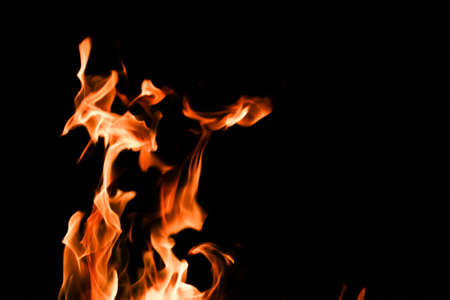 Fire flame on black background short exposureの写真素材