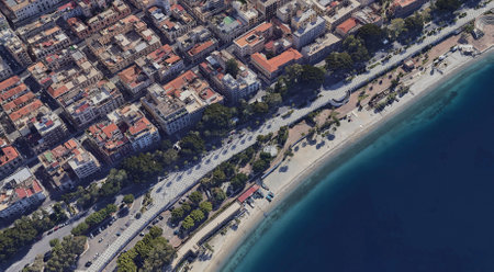Reggio Calabria's Coastline from Above: Ionian Sea and Urban Landscape in summerの写真素材