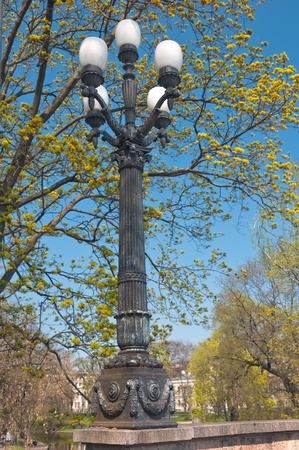 Street a retro a lantern against park and the blue skyの写真素材