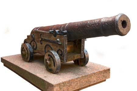 Old medieval cannon on gun carriage isolated on whiteの写真素材