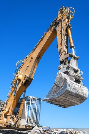 Yellow excavator at workの写真素材