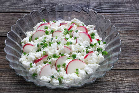 Cottage cheese with radish and chivesの写真素材