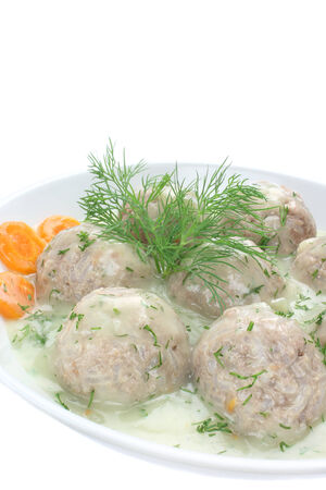 Meatballs of pork and rice with dill sauceの写真素材