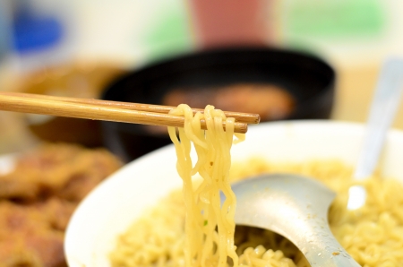Closeup of chopstick clamp the noodle の写真素材