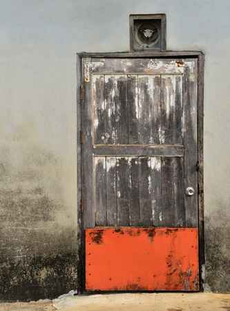 The old door and grunge wall の写真素材