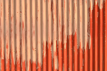 Abstract background of old zinc painted red wall disintegration 