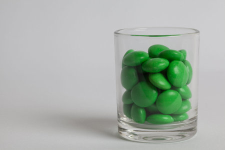 A glass of green candies