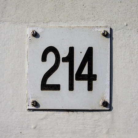 house number 214 engraved in Formicaの写真素材