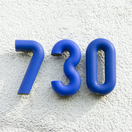 house number seven hundred thirty, made out of blue tube shaped lettering