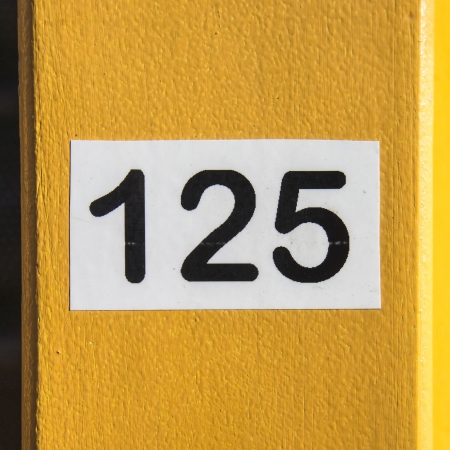 house number one hundred and twenty-five, printed with a label printerの写真素材
