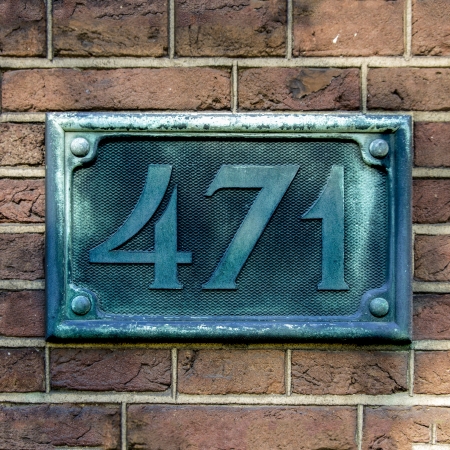 bronze cast house number four hundred and seventy-oneの写真素材