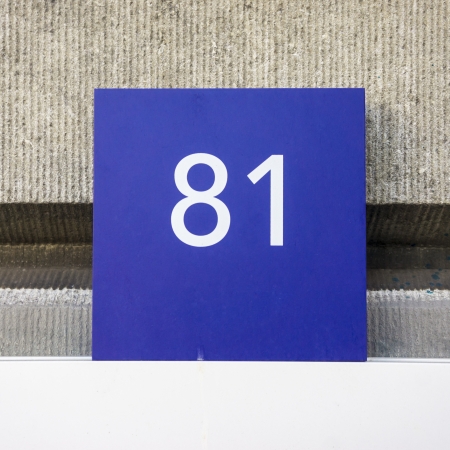 House number eighty-one  white lettering on a blue backgroundの写真素材