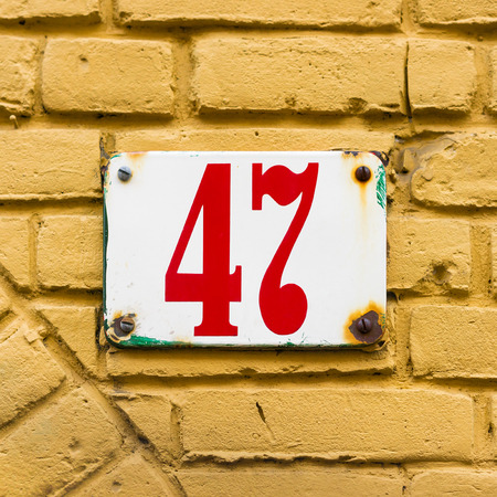 enameled house number forty sevenの写真素材