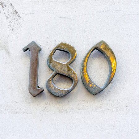 Bronze house number one hundred and eightyの写真素材
