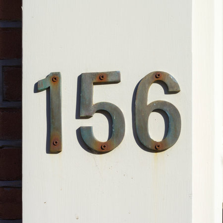 House number one hundred and fifty six.の写真素材