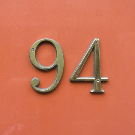 Bronze house number ninety four.の写真素材