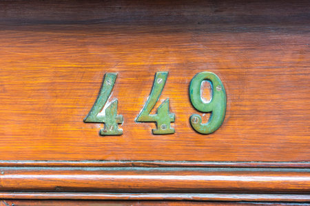 Bronze house number four hundred and forty nine (449)