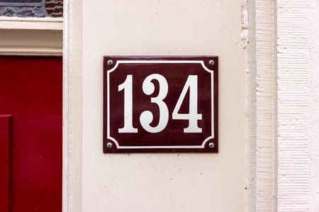 Enameled house number one hundred and thirty fourの写真素材