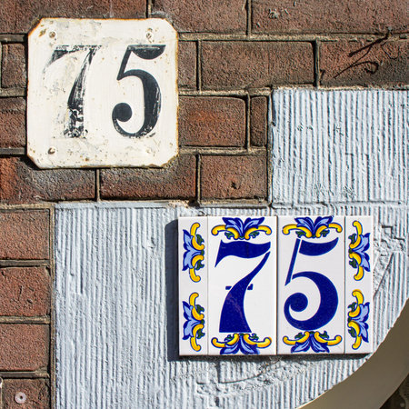 two times house number seventy five (75)