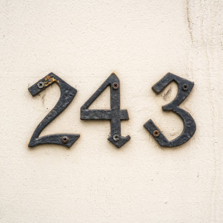 forged metal house number two hundred and forty three