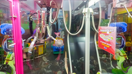 Close-up view of the interior of a claw machin