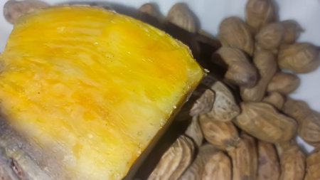 Steamed Purple Sweet Potato with peanut Slices on White