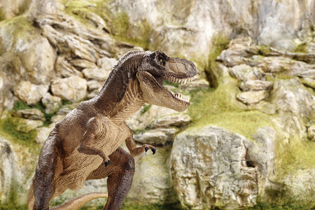 detailed miniature mountain model with dinosaurの写真素材