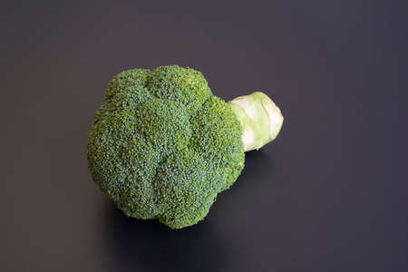 Healthy Green Organic Broccoli isolated on Blackの写真素材