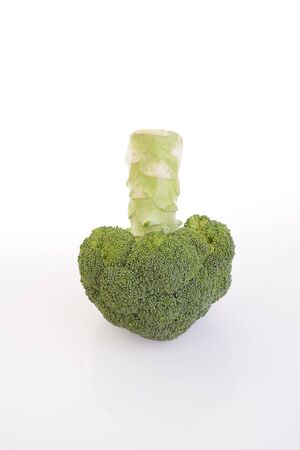 fresh green broccoli vegetables on white backgroundの写真素材