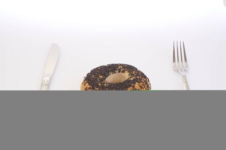 ham and  bagel with coffee on cutting board in isolated white backgroundの写真素材