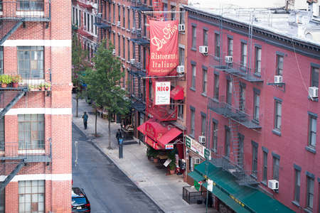 photo of New York building with fire escape ladders, USA.のeditorial素材