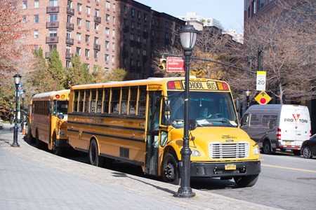 NEW YORK CITY - November 07, 2016 : typical NYC yellow school bus in Manhattan.のeditorial素材