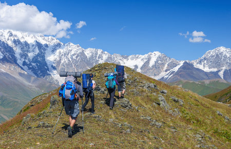 Group of trekkers in the summer mountains. Georgia, Svanetia.の写真素材