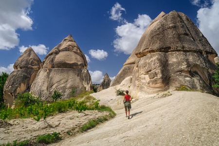 Yung girl walking in Love Valley of Cappadocia - Turkeyの写真素材