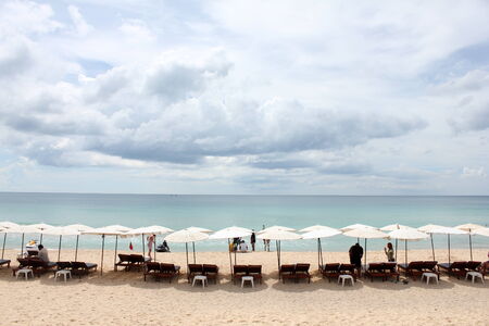 reclining chair on the beachの写真素材