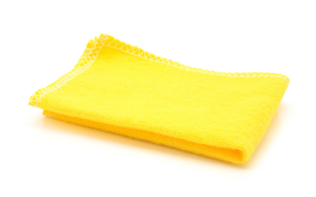 yellow cloth for cleaning on a white backgroundの写真素材