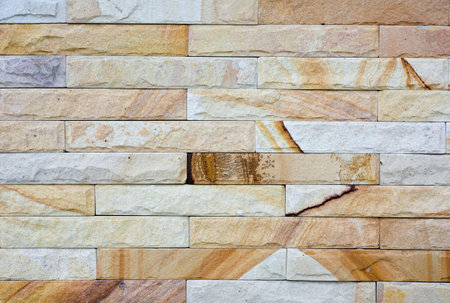 sand stone wall texture and background of decorate