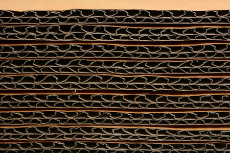 Closeup side view of a stacked corrugated cardboardの写真素材