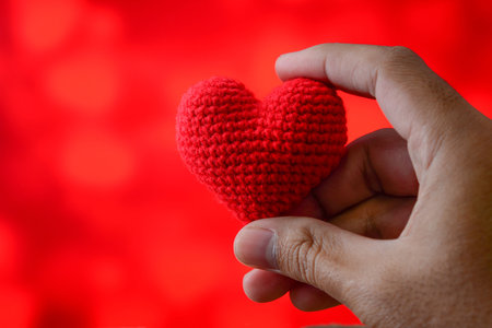Pick red heart with beautiful red background
