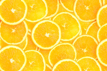 citrus-fruit of orange slices. Close-up. background texture