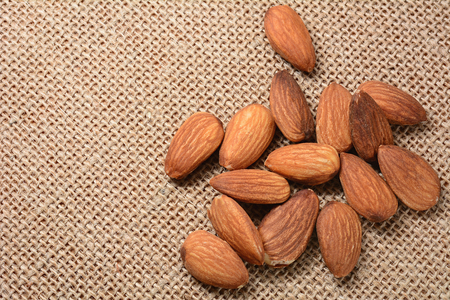 Closeup for Almond heap on sackclothの写真素材