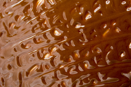 Chocolate spread as texture backgroundの写真素材