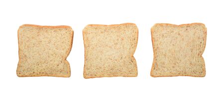 Three fresh whole wheat bread slices isolated on a white backgroundの写真素材