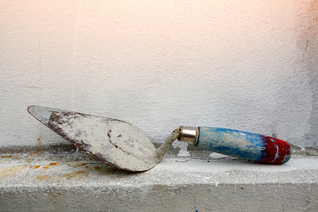 Closeup for trowel on cement wallの写真素材