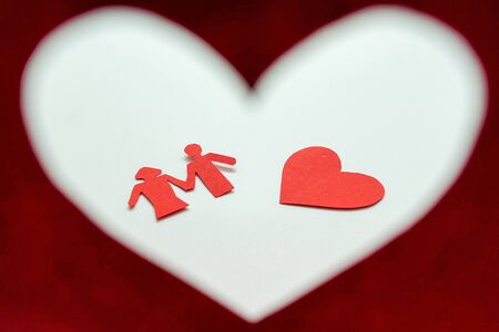 Paper of female and male in red Valentine's heartの写真素材