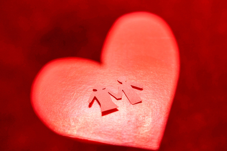 Paper of female and male in red Valentine's heartの写真素材
