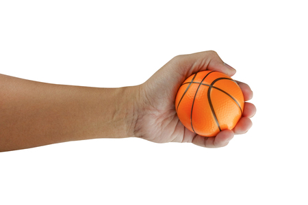 Small basket ball on hand isolated on white background with clipping pathの写真素材