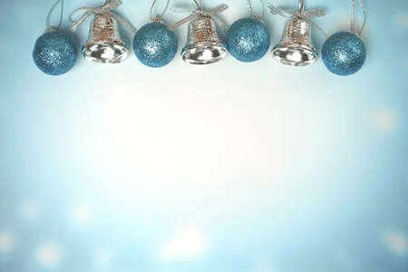 Winter background - Cyan christmas ball and bellの写真素材