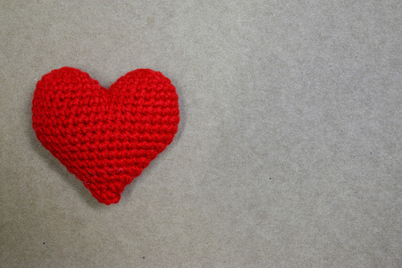 Red heart on vintage paper with copyspaceの写真素材